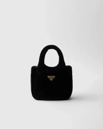 Mini bolso de mano acolchado de terciopelo