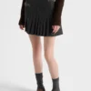 Minifalda de lana plisada con costura de junco Minifalda de lana plisada con costura de junco