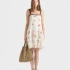 Minivestido de lino bordado con motivos florales Minivestido de lino bordado con motivos florales