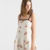 Minivestido de lino bordado con motivos florales Minivestido de lino bordado con motivos florales