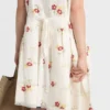 Minivestido de lino bordado con motivos florales Minivestido de lino bordado con motivos florales
