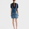 Minivestido tipo peto de denim Minivestido tipo peto de denim