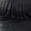Mules de cuero con correa tipo monk y flecos