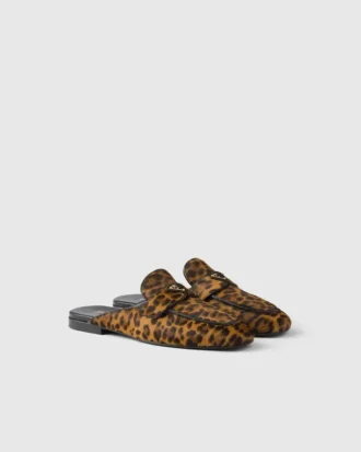 Mules de piel con estampado de leopardo