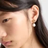Pendientes de metal con perlas Pendientes de metal con perlas