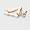 Pendientes largos con corte en oro amarillo y diamantes de la colección Eternal Gold Pendientes largos con corte en oro amarillo y diamantes de la colección Eternal Gold
