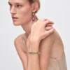Pulsera Couleur Vivante – Oro blanco con aguamarina y peridoto Pulsera Couleur Vivante – Oro blanco con aguamarina y peridoto
