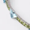 Pulsera Couleur Vivante – Oro blanco con aguamarina y peridoto Pulsera Couleur Vivante – Oro blanco con aguamarina y peridoto