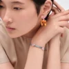 Pulsera Couleur Vivante – Oro blanco con morganita y aguamarina