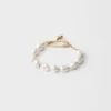 Pulsera de metal con perlas Pulsera de metal con perlas