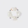 Pulsera de plata con conchas