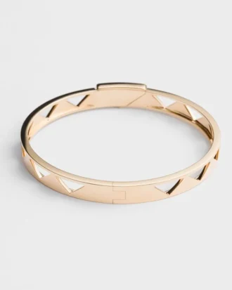 Pulsera rígida con aberturas Eternal Gold en oro amarillo
