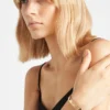 Pulsera rígida con aberturas Eternal Gold en oro amarillo