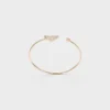 Pulsera rígida Eternal Gold en oro amarillo con diamantes Pulsera rígida Eternal Gold en oro amarillo con diamantes