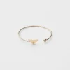 Pulsera rígida Eternal Gold en oro amarillo con diamantes Pulsera rígida Eternal Gold en oro amarillo con diamantes