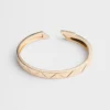 Pulsera rígida Eternal Gold en oro amarillo con diamantes Pulsera rígida Eternal Gold en oro amarillo con diamantes