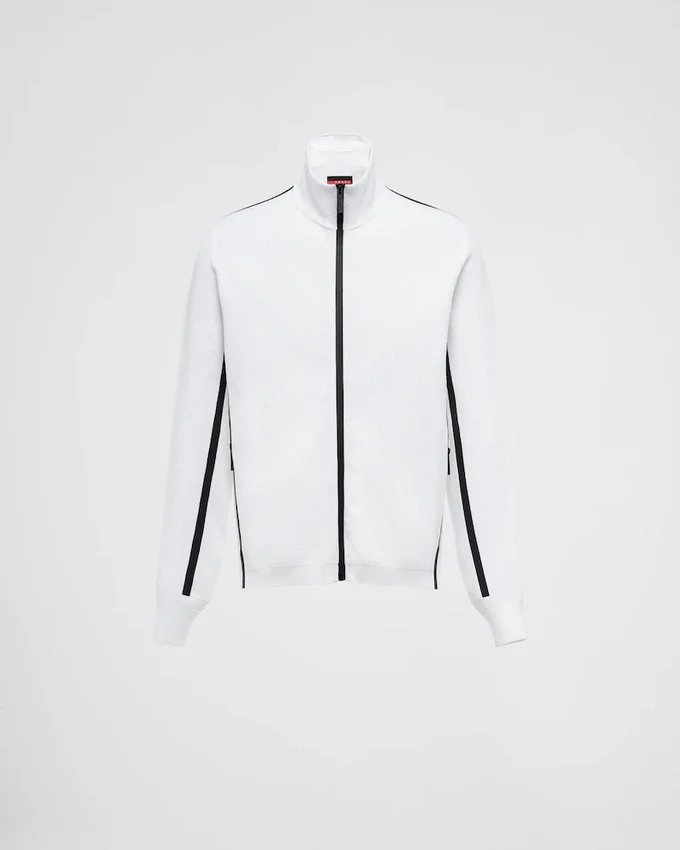 Sudadera con cuello alto y cremallera de punto técnico Sudadera con cuello alto y cremallera de punto técnico