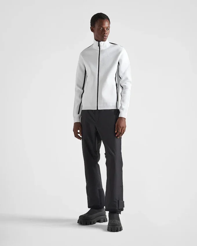 Sudadera con cuello alto y cremallera de punto técnico Sudadera con cuello alto y cremallera de punto técnico