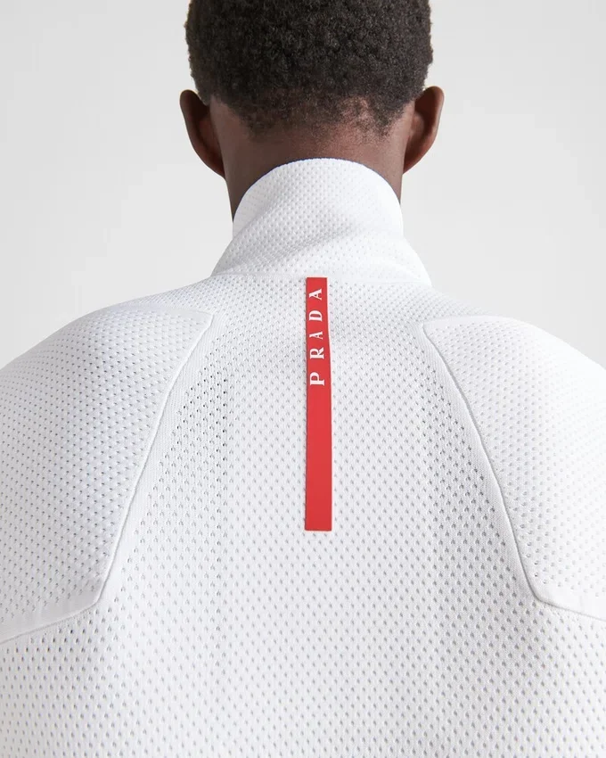Sudadera con cuello alto y cremallera de punto técnico Sudadera con cuello alto y cremallera de punto técnico