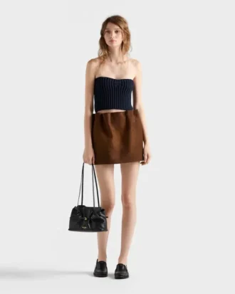 Top bandeau de lana y cachemira con colgante