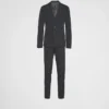 Traje de una sola botonadura en tejido elástico técnico Traje de una sola botonadura en tejido elástico técnico