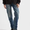 Vaqueros de denim con ribete y corte cónico Vaqueros de denim con ribete y corte cónico