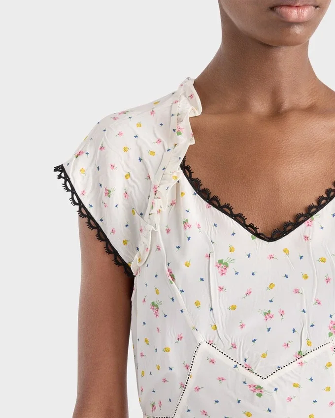 Vestido de ponga con estampado floral Vestido de ponga con estampado floral
