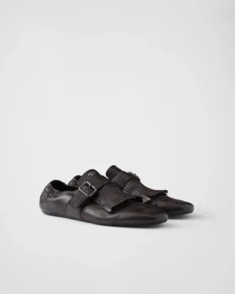 Zapatos con hebilla y flecos Shuffle